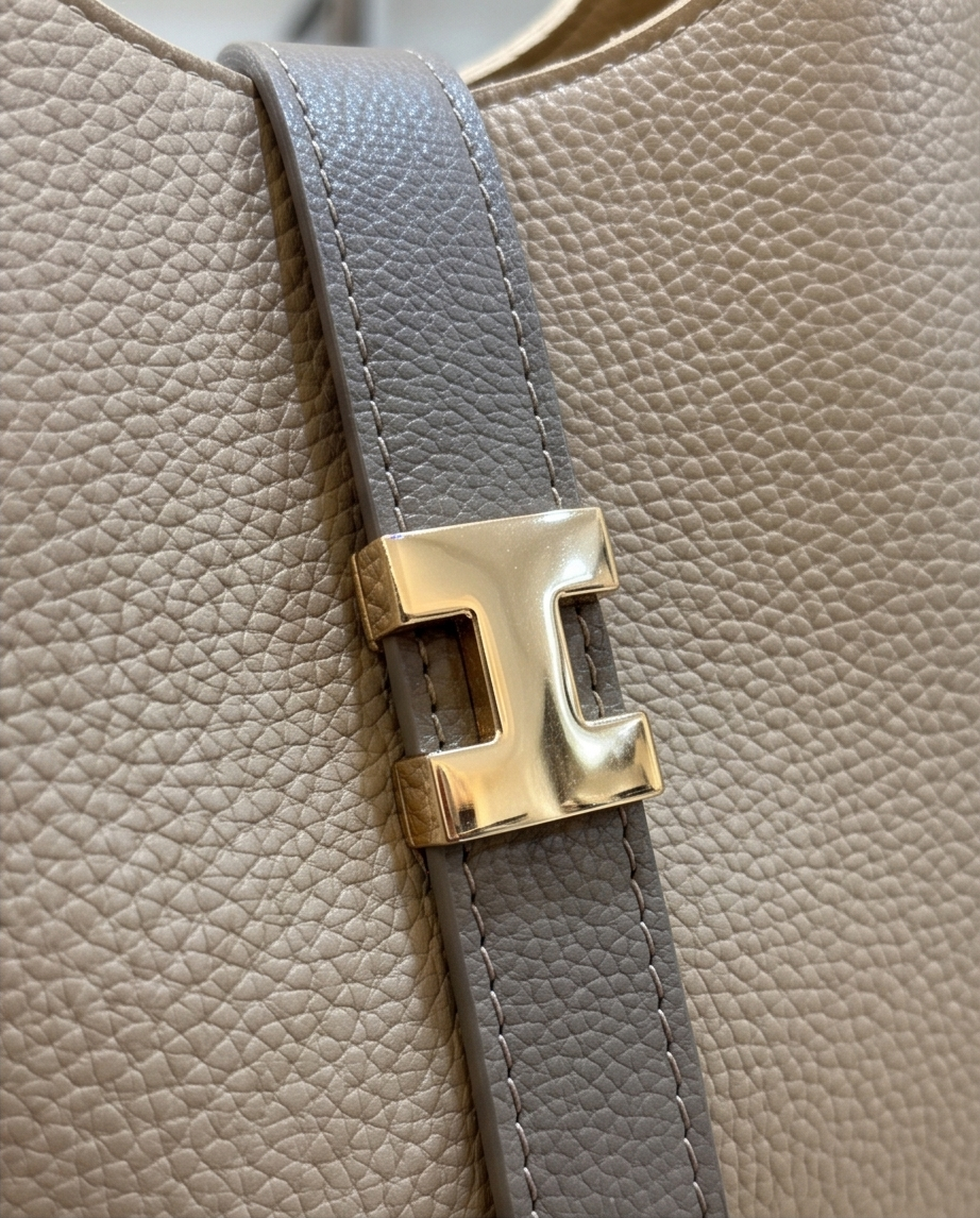 Medium-sized casual handbag by Monroe Lace featuring a sleek design with shoulder strap and stylish silhouette.