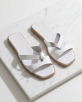 White Monroe Lace non-slip slides with cushioned straps, perfect for casual wear and comfortable walking.