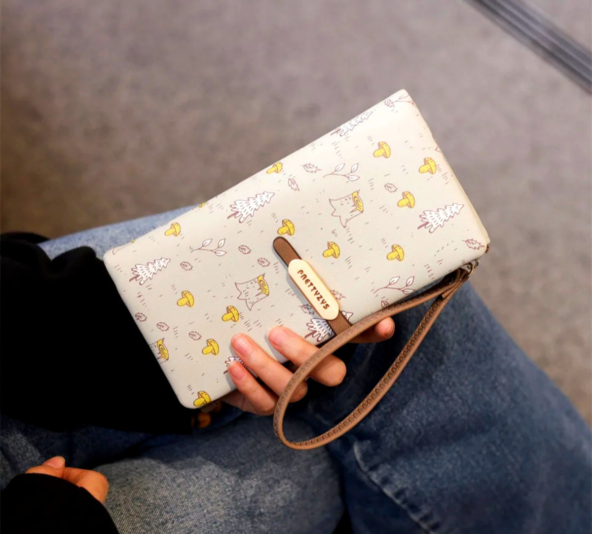 Printed Monroe Lace multifunctional wallet with multiple card slots and a zippered coin pocket, featuring vibrant floral design.