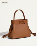 Medium-sized Monroe Lace handbag with 28cm width and 21cm height, featuring elegant design and structured shape.