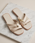 Beige Monroe Lace non-slip slides with cushioned straps, perfect for comfortable casual wear.