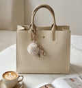 Large casual bag by Monroe Lace with spacious interior, stylish design, and comfortable shoulder strap for everyday use.