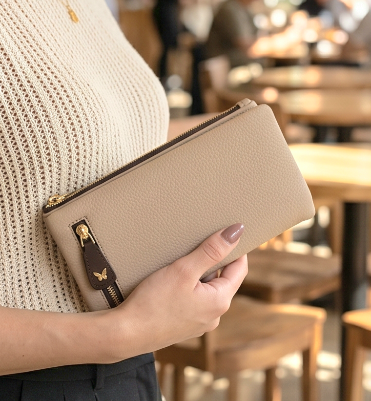 Monroe Lace multifunctional long wallet with multiple card slots, cash compartments, and sleek design in a close-up view.