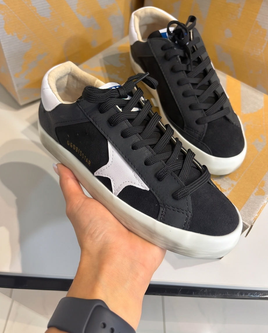 Golden Goose Monroe Lace sneakers with white leather and gold accents, featuring stylish laces and a modern casual design.
