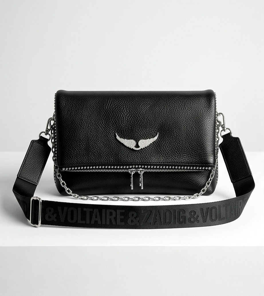 Medium-sized Monroe Lace designer's bag with sleek black leather, top handles, and minimalist silver hardware.