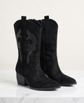 Western suede boots by Monroe Lace with pointed toes and stacked heels, featuring classic Western stitching and a tan finish.