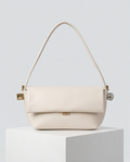 Small elegant handbag by Monroe Lace featuring a sleek design and sophisticated style, perfect for formal occasions.
