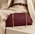 Burgundy Monroe Lace clutch bag with elegant design, featuring a sleek and compact style for evening or special occasions.
