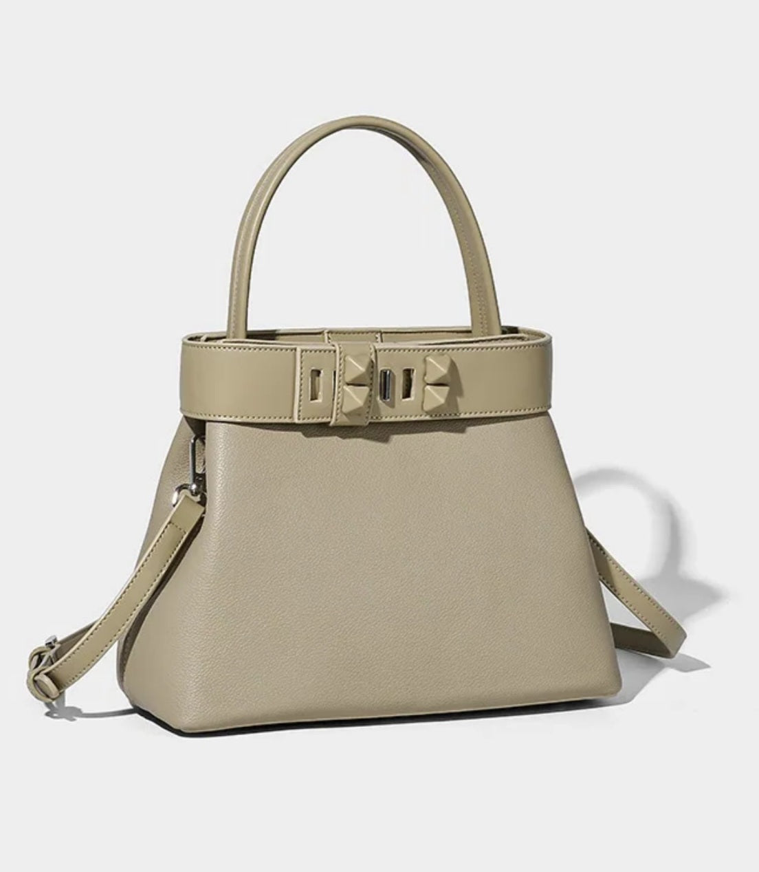Medium size Monroe Lace handbag showing structured design, beige color, and top handles with decorative lace accents.