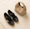 Monroe Lace Samba Mary Jane shoes with black leather, rounded toe, and ankle strap, displayed on a neutral background.