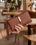Monroe Lace multifunctional long wallet with multiple card slots and a sleek leather design, ideal for organizing cash and cards.