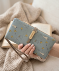Printed Monroe Lace multifunctional wallet with multiple card slots and a zippered coin pocket, featuring a colorful floral design.