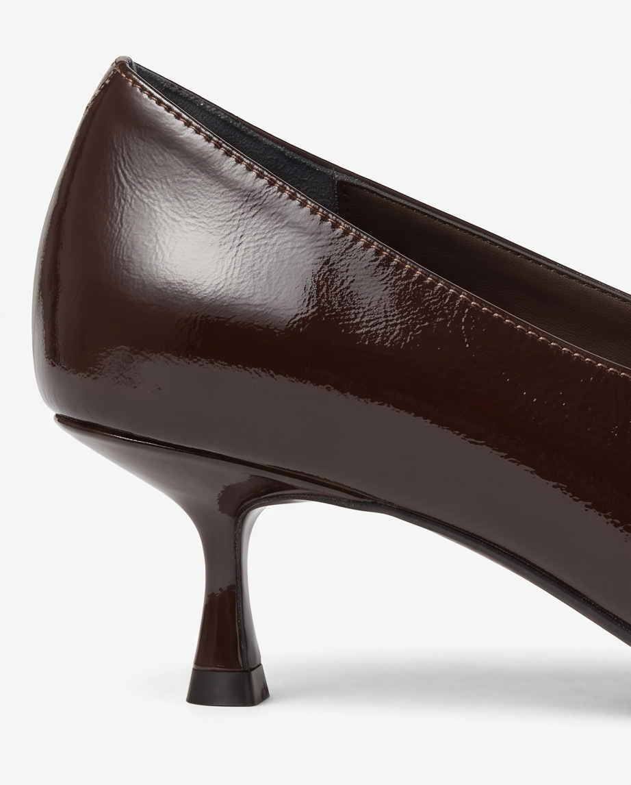 Brown Monroe Lace 6cm heel pumps with pointed toe and elegant design, perfect for stylish everyday or formal wear.
