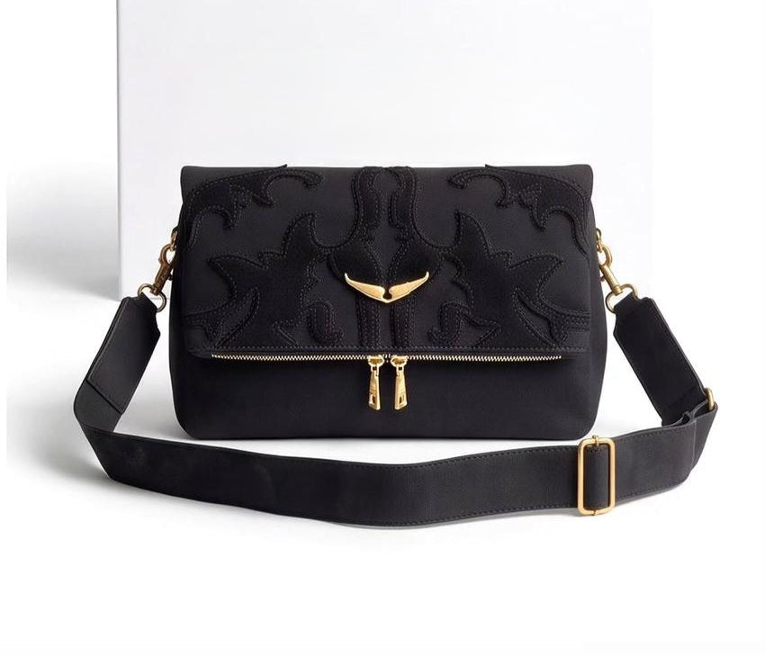 Medium-sized Monroe Lace designer's bag with sleek leather finish and elegant handles, perfect for stylish everyday use.