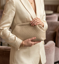 Beige Monroe Lace clutch bag with a sleek, elegant design, featuring a smooth fabric finish and subtle stitching details.