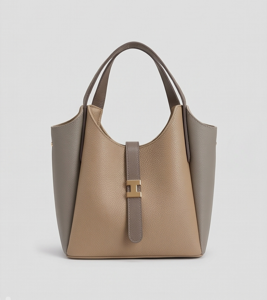 Medium-sized casual handbag by Monroe Lace with top handles and a sleek design, perfect for everyday use.