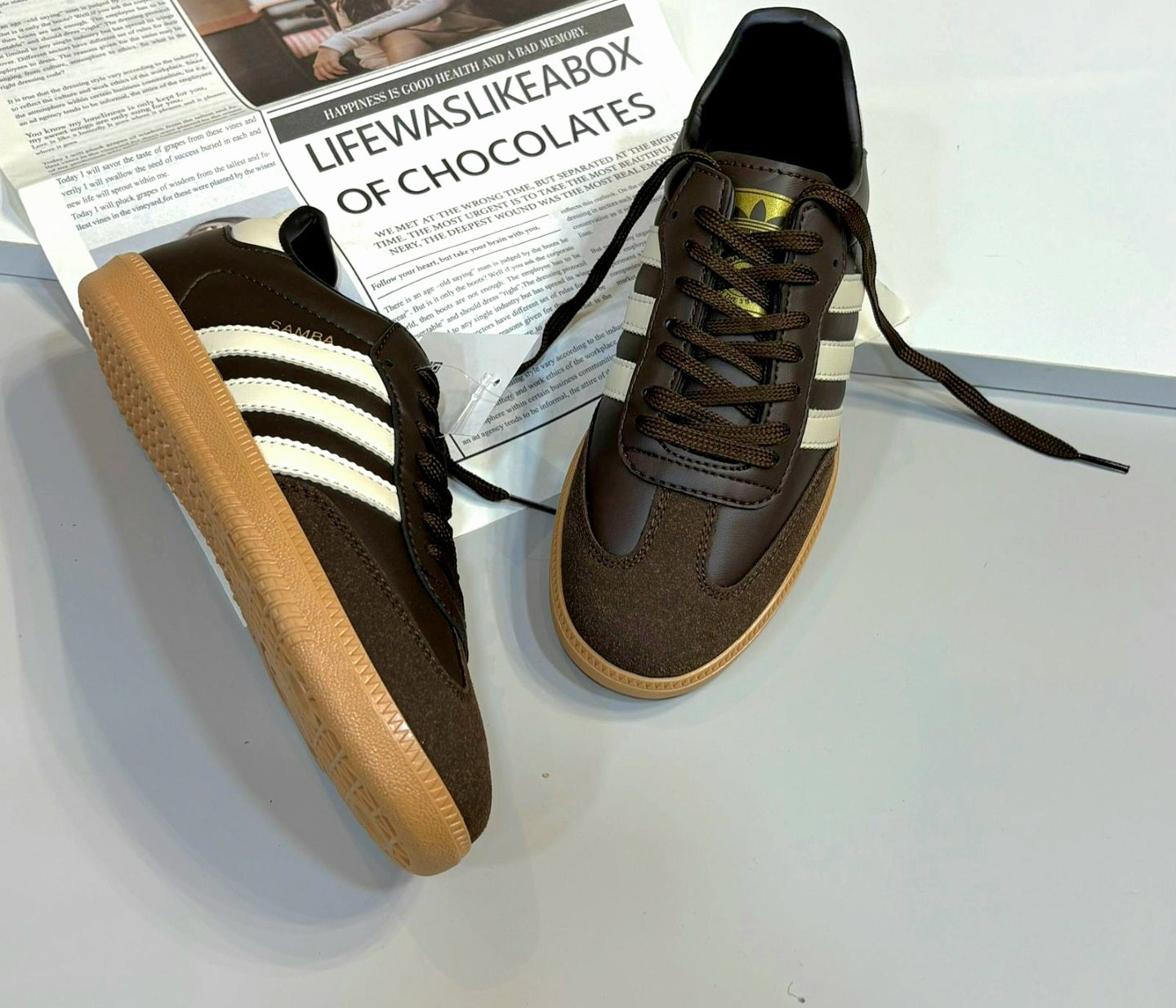Black Adidas Samba sneakers with Monroe Lace detailing, featuring classic design and white rubber soles.