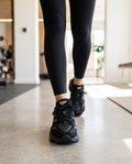 New Balance 9060 Monroe Lace sneakers featuring a modern design with white and gray color accents.