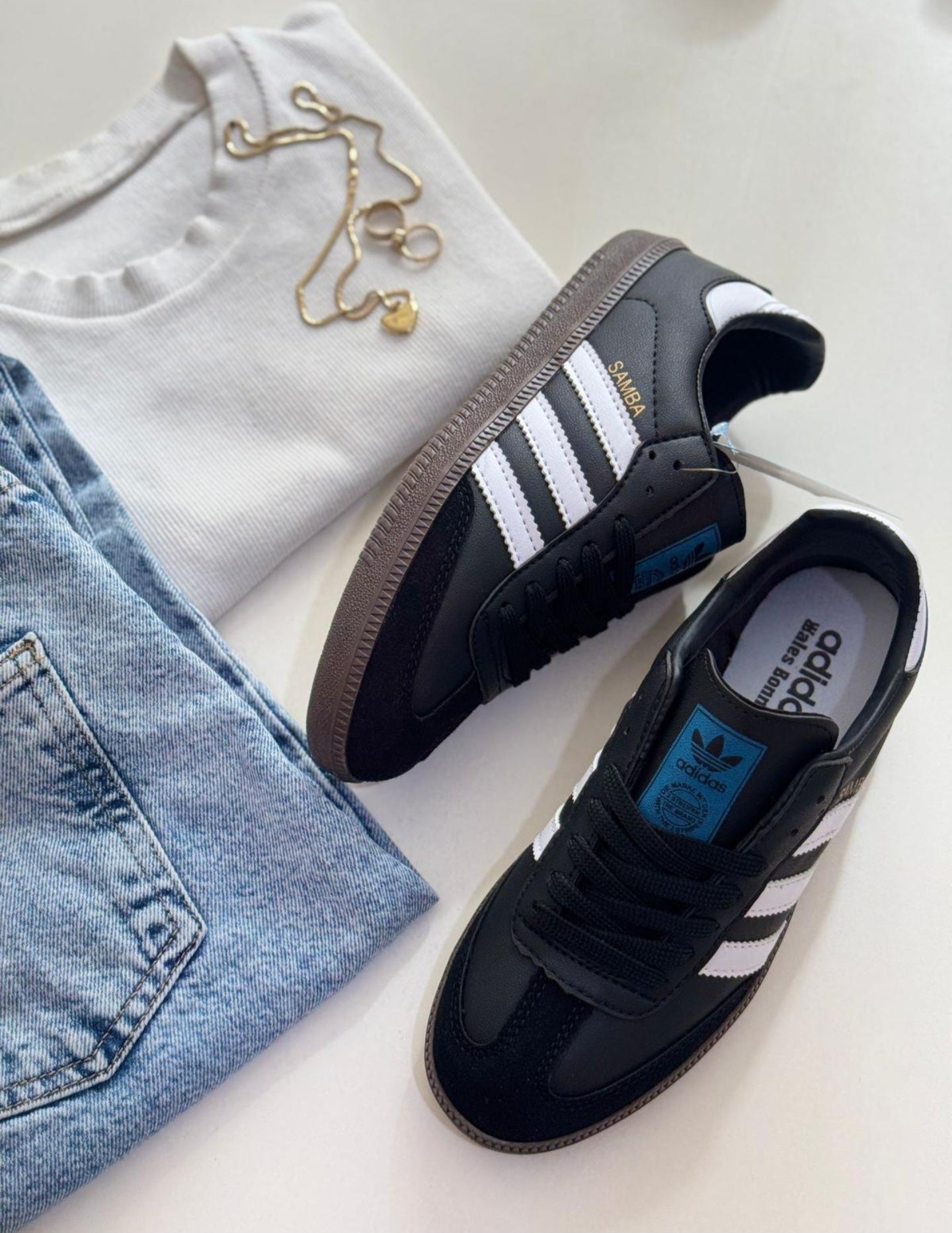 Adidas Samba sneakers by Monroe Lace, featuring classic black and white design with leather and suede upper details