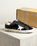 Golden Goose Monroe Lace sneakers with white leather and gold accents, featuring signature branding and stylish design.