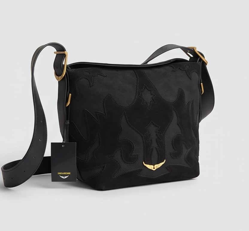 Medium size Monroe Lace designer's bag showing elegant leather exterior and stylish handle on a plain background.