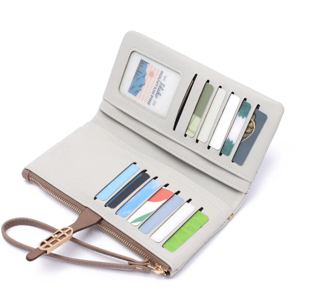 Multifunctional printed wallet by Monroe Lace featuring colorful patterns, multiple card slots, and a sleek compact design.
